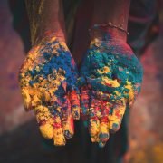 closeup photo of person holding color soils