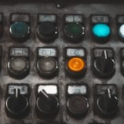 A close up of a control panel with buttons