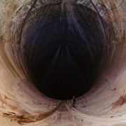 man inside tunnel during daytime