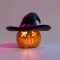 a halloween pumpkin with a witch hat on it