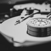 white and black turntable in grayscale photography