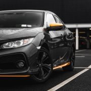 black and yellow bmw m 3 on road during daytime