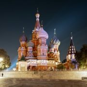 a large building with many spires lit up at night